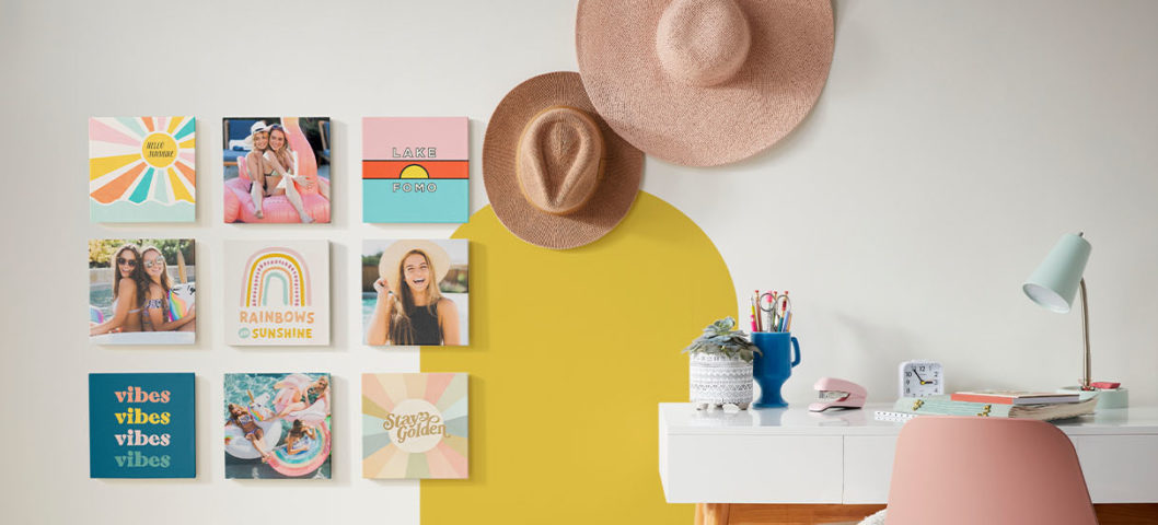 Photo tiles in a set of 9 on a wall with hats displayed and a white desk with a pink chair hero