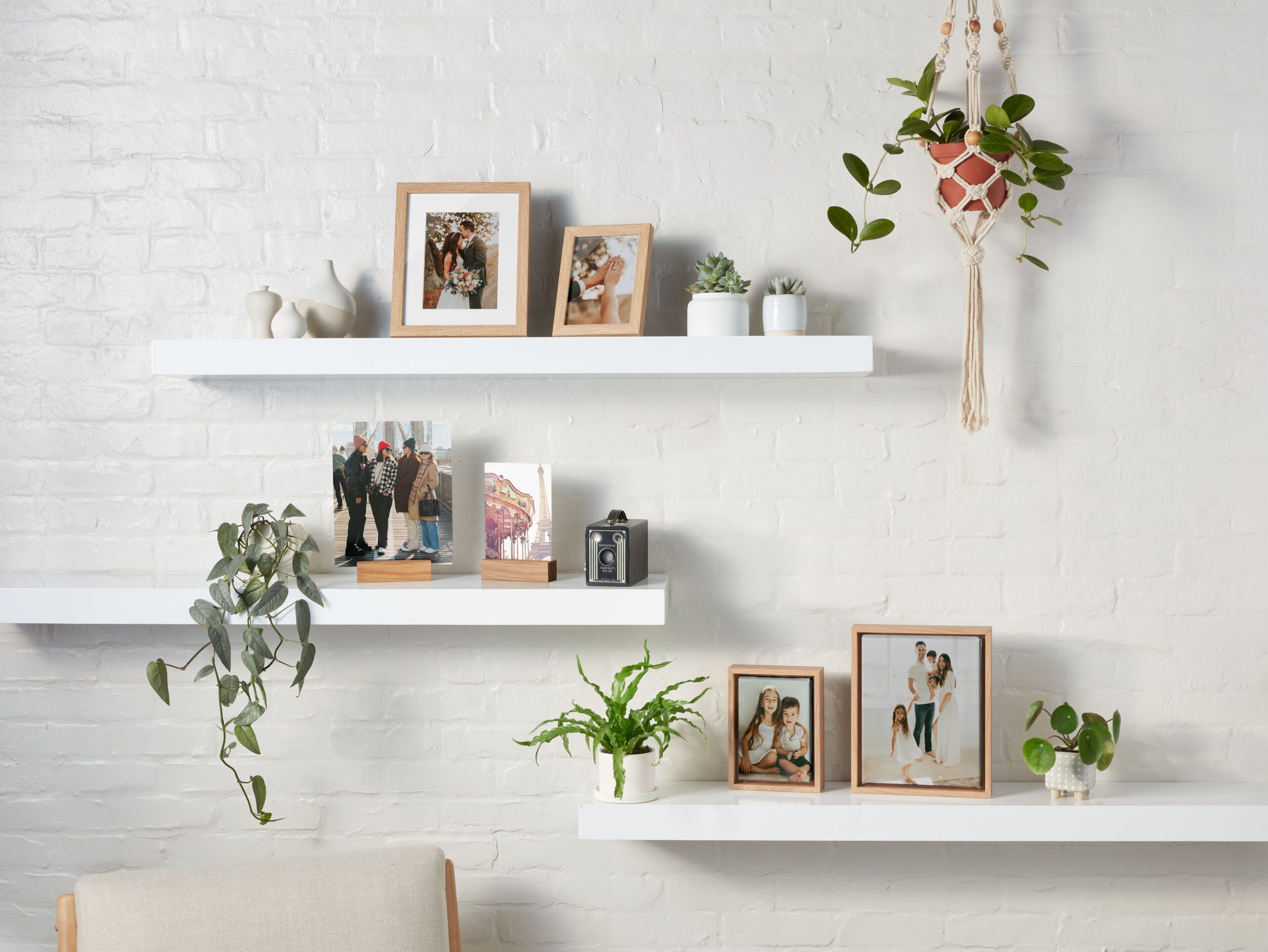 tabletop prints with pictures of a couple and family