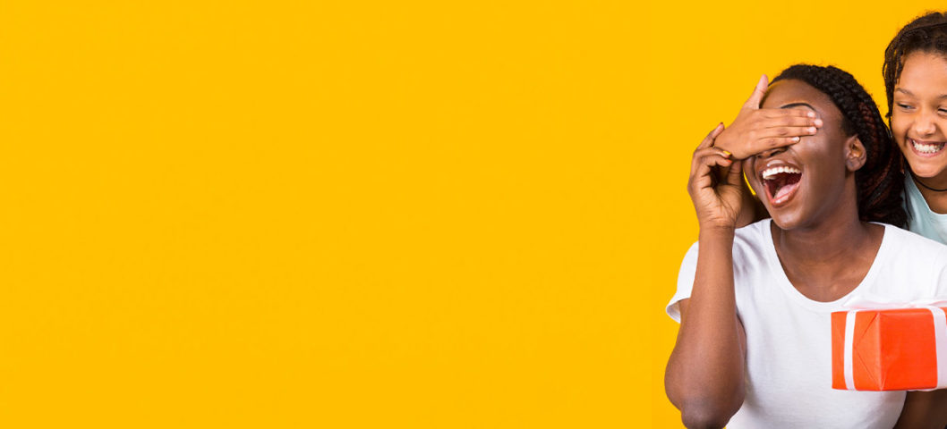 Best gifts for mom with a mom and daughter recieving a present