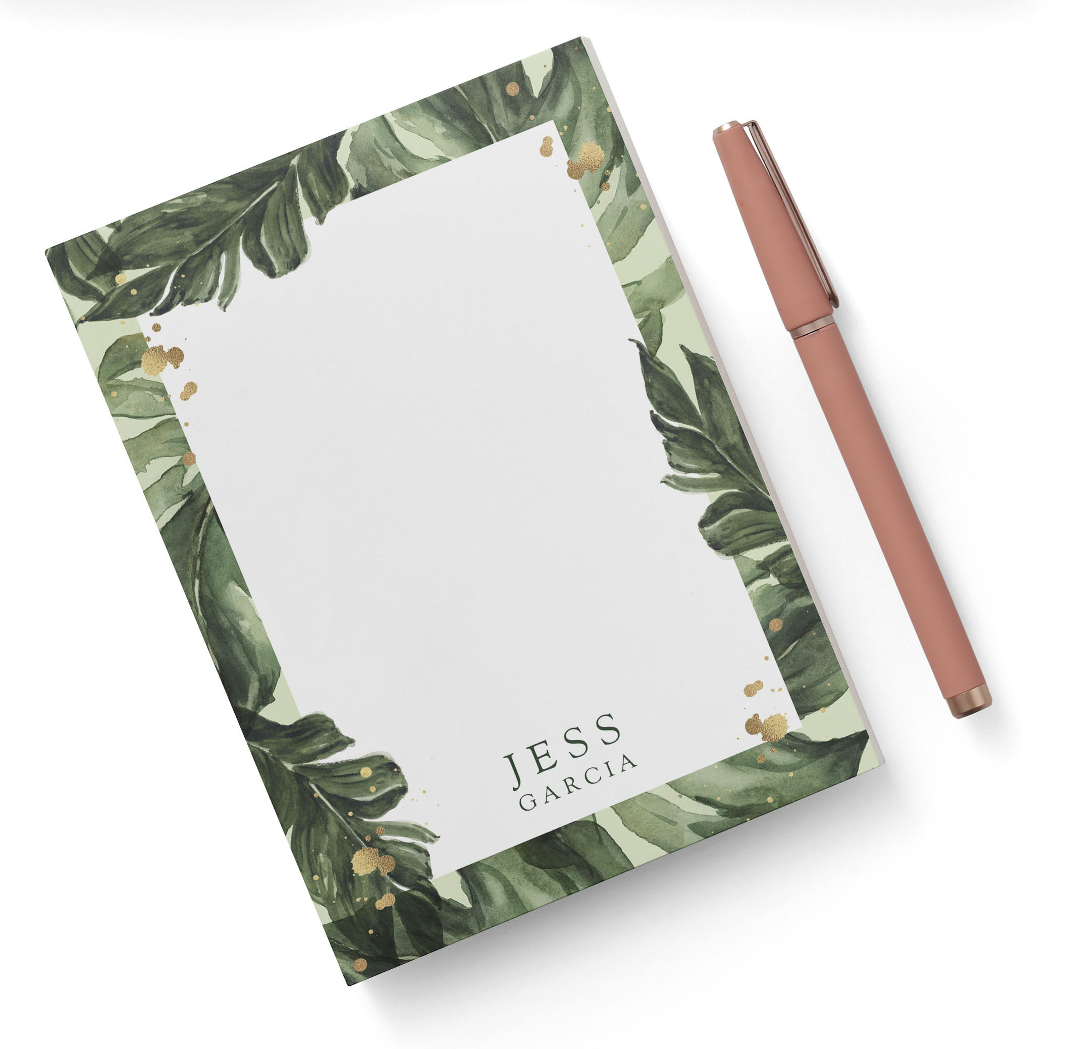 Personalized notepad with a green botanical border featuring a pink pen