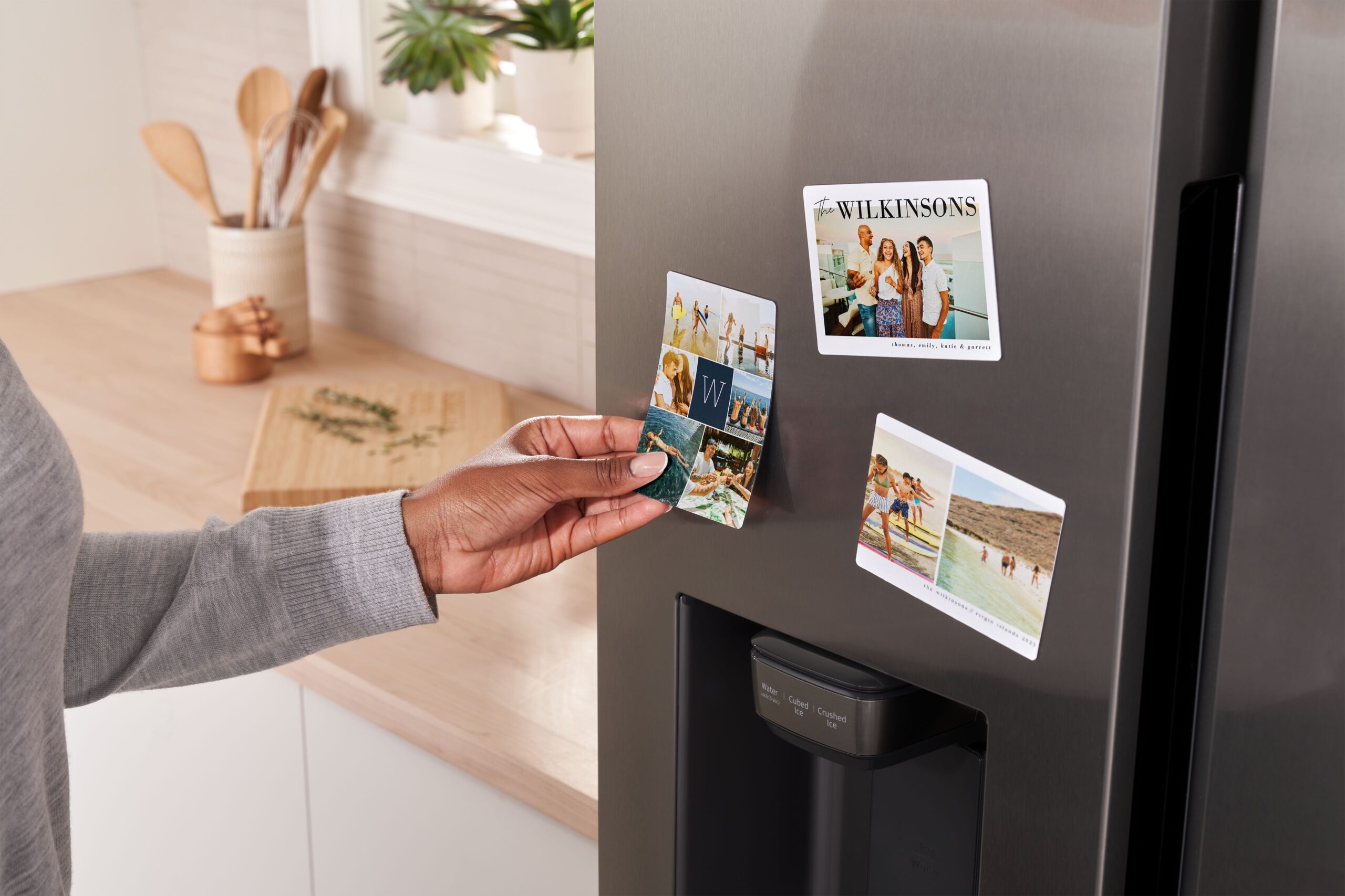three photo magnets displaying travel pictures