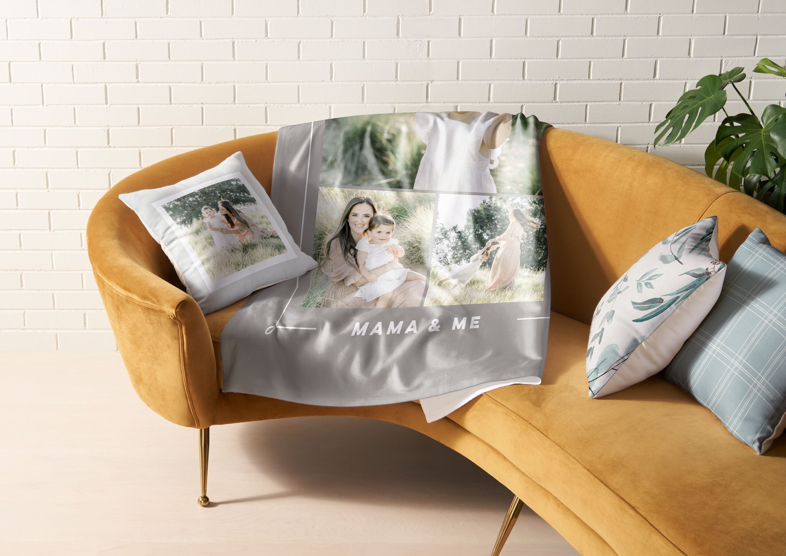 fleece photo blanket and photo pillow on a couch
