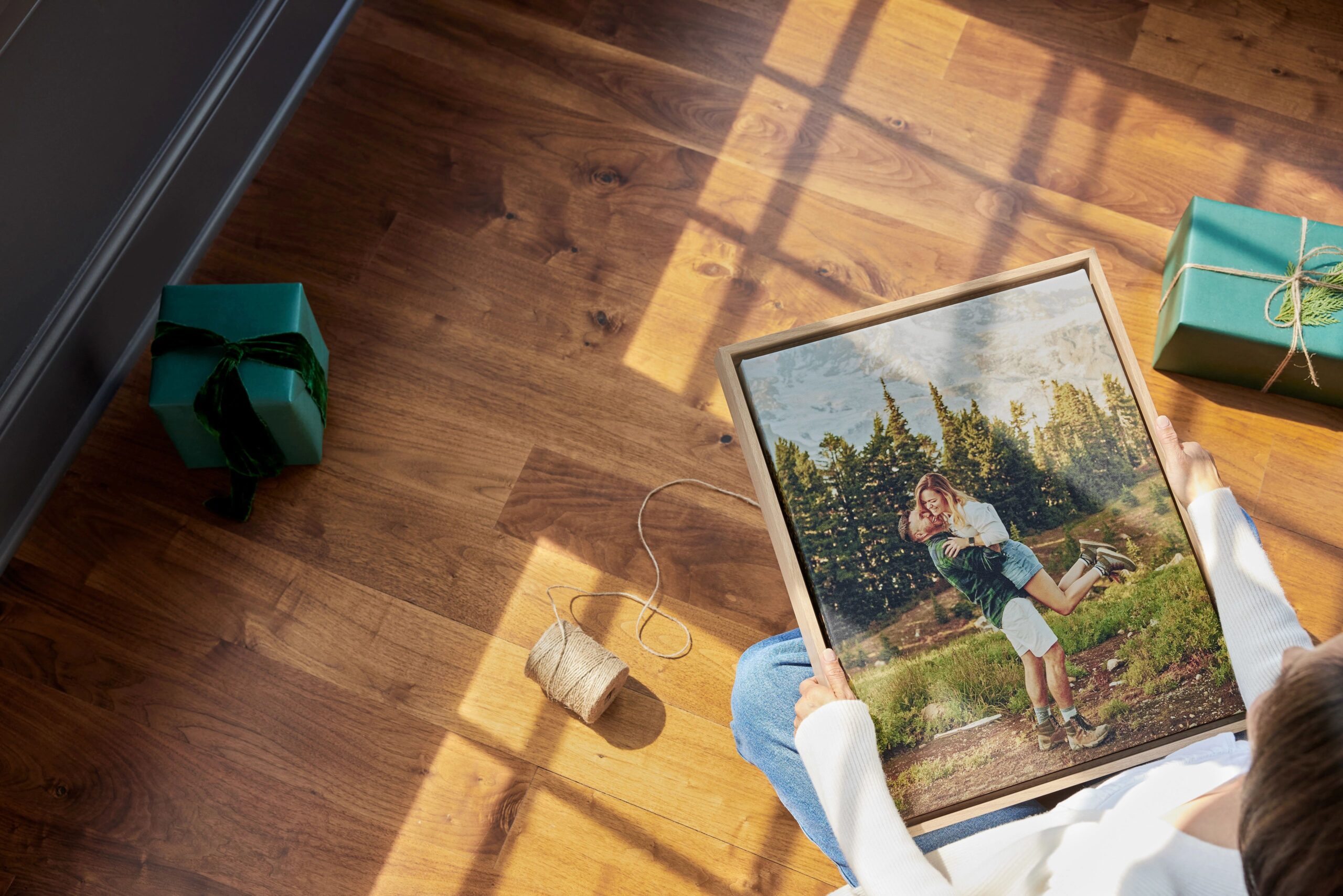 woman holding canvas print