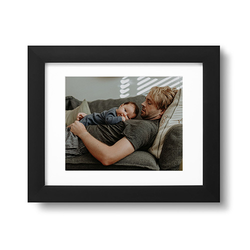 framed print with picture of dad and baby