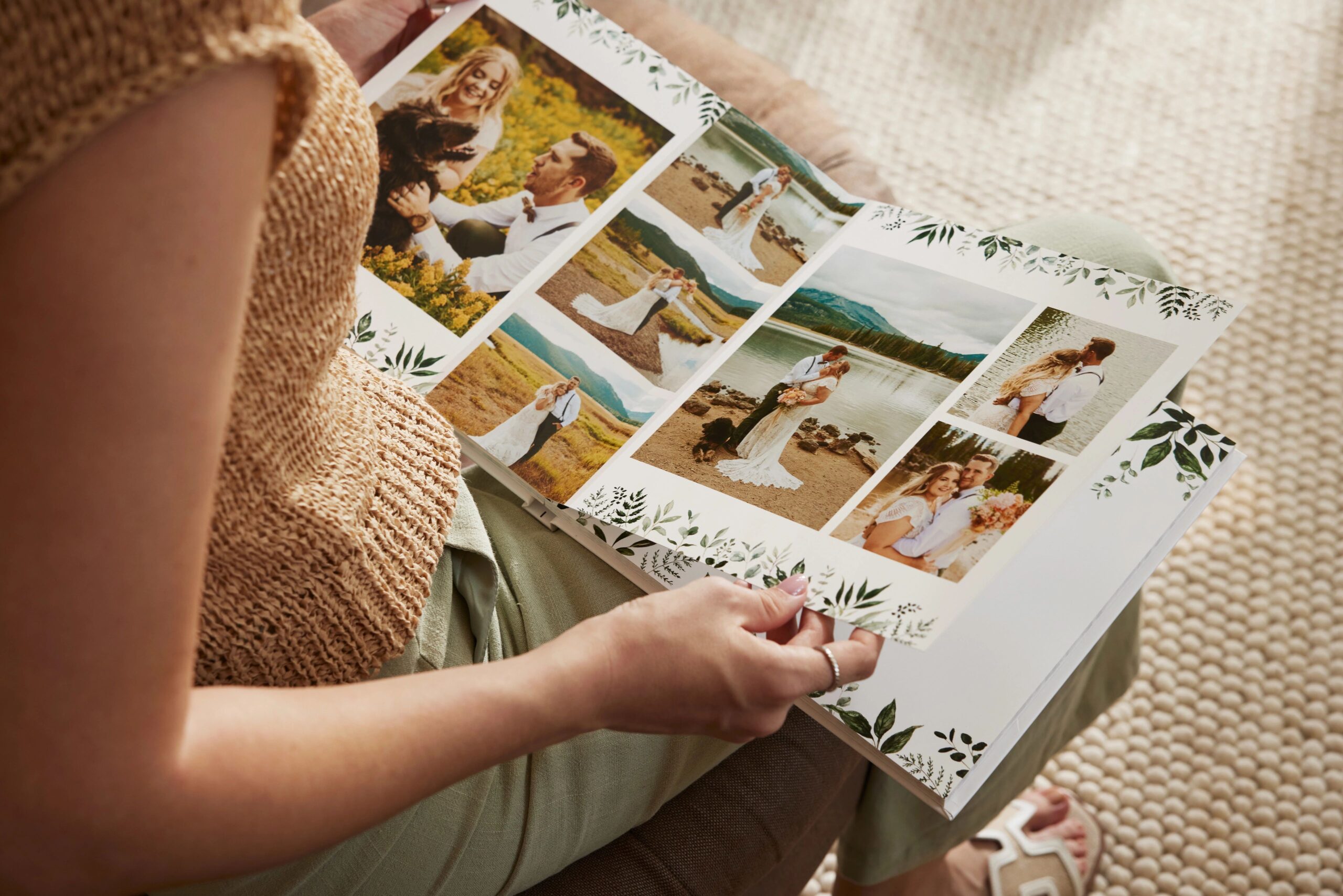woman flipping through a wedding photo album