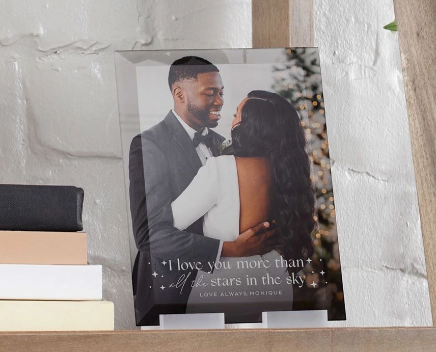 glass print with photo of couple embracing
