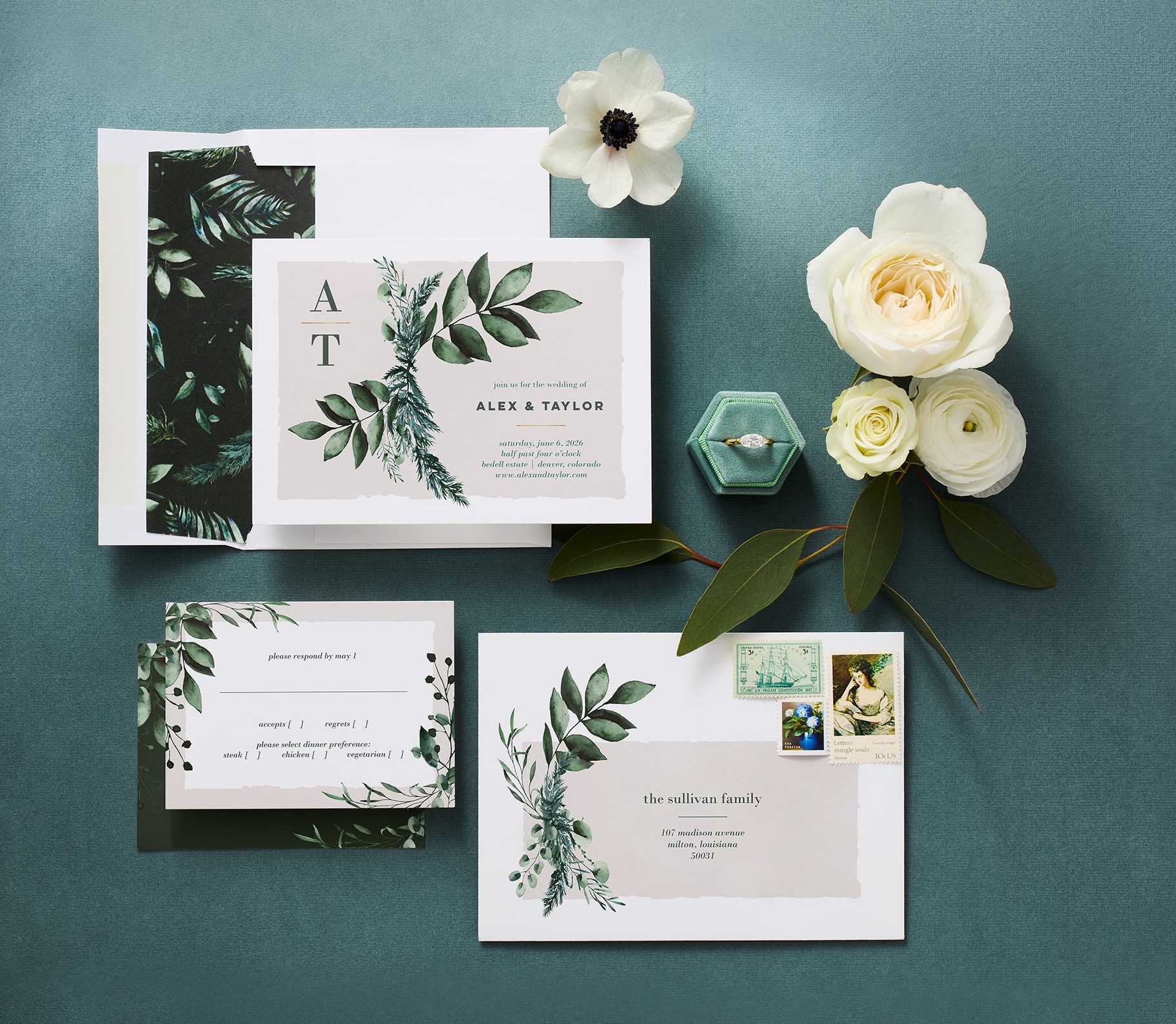 wedding invitation suite and flowers